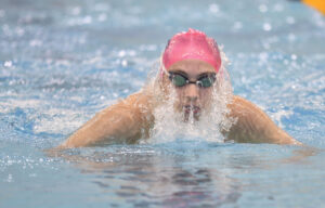 Riggs breaks two individual records, helps set two relay records; MHS claims 2nd place at Region I swim meet